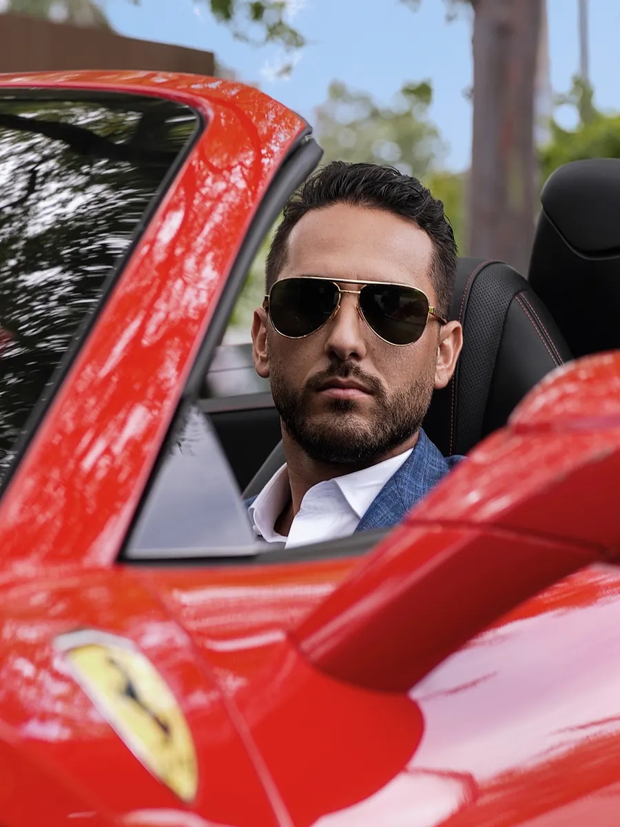 Torino, behind the wheel of the red Ferrari