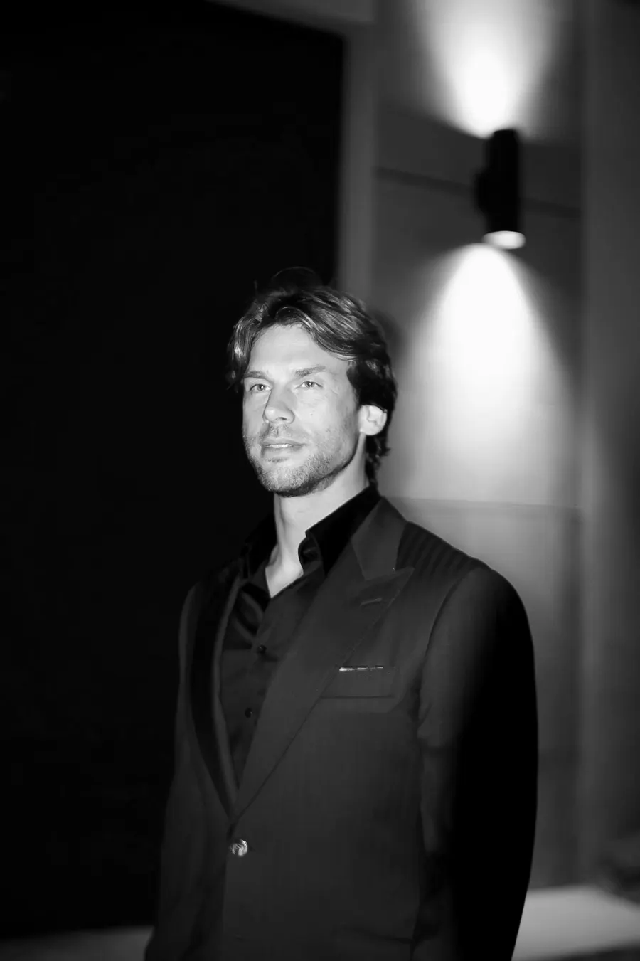 Navy suit at night, black and white portrait